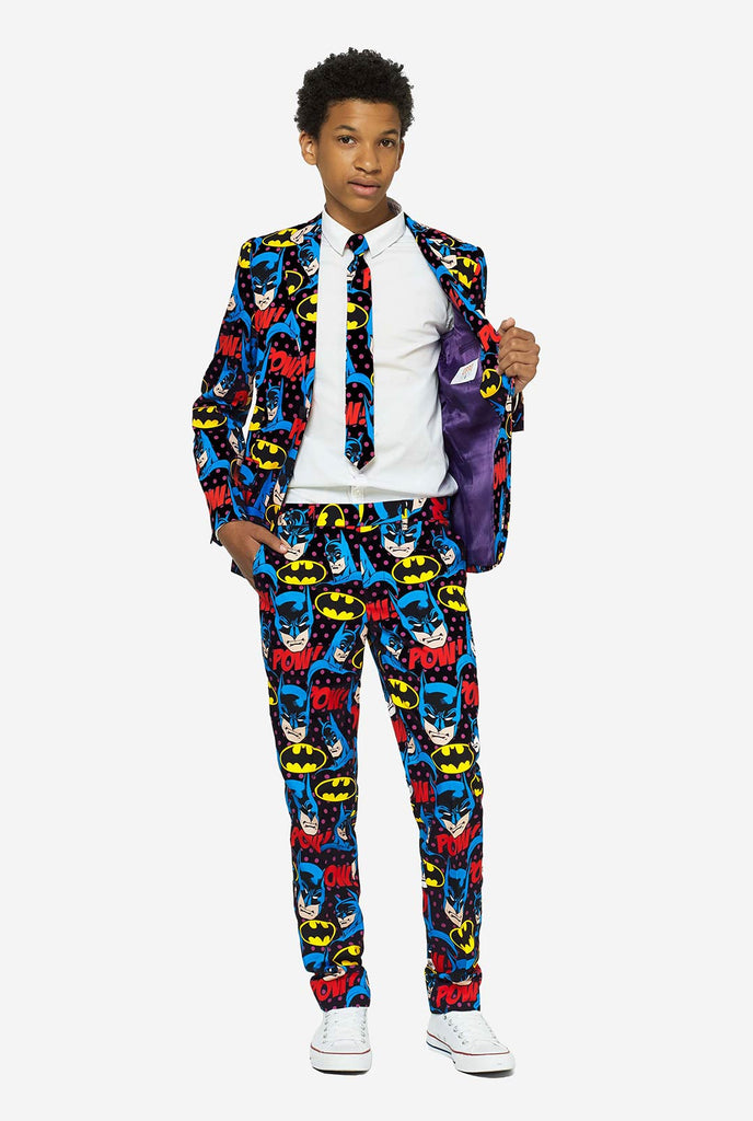 Teen wearing form suit with Batman print