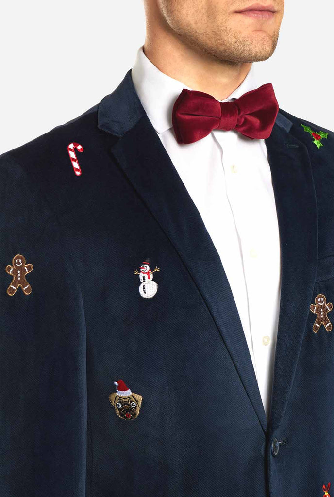 Man wearing navy blue Christmas blazer with Christmas embroidery