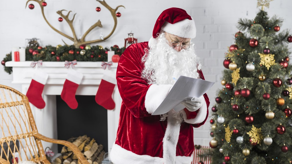 Santa Claus looking at paper in living room decorated with Christmas items and Christmas tree