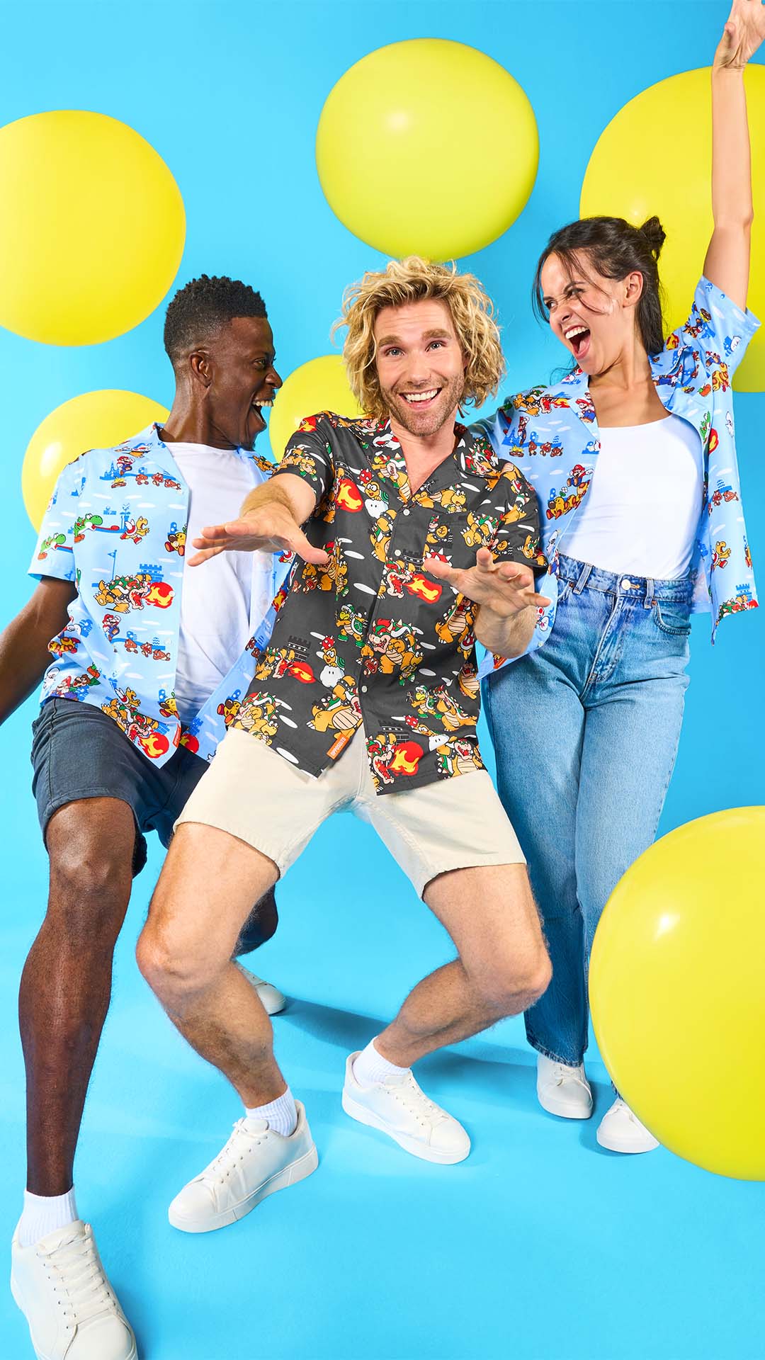 Image with blue background and yellow balloons and 3 people partying wearing Super Mario Hawaiians.