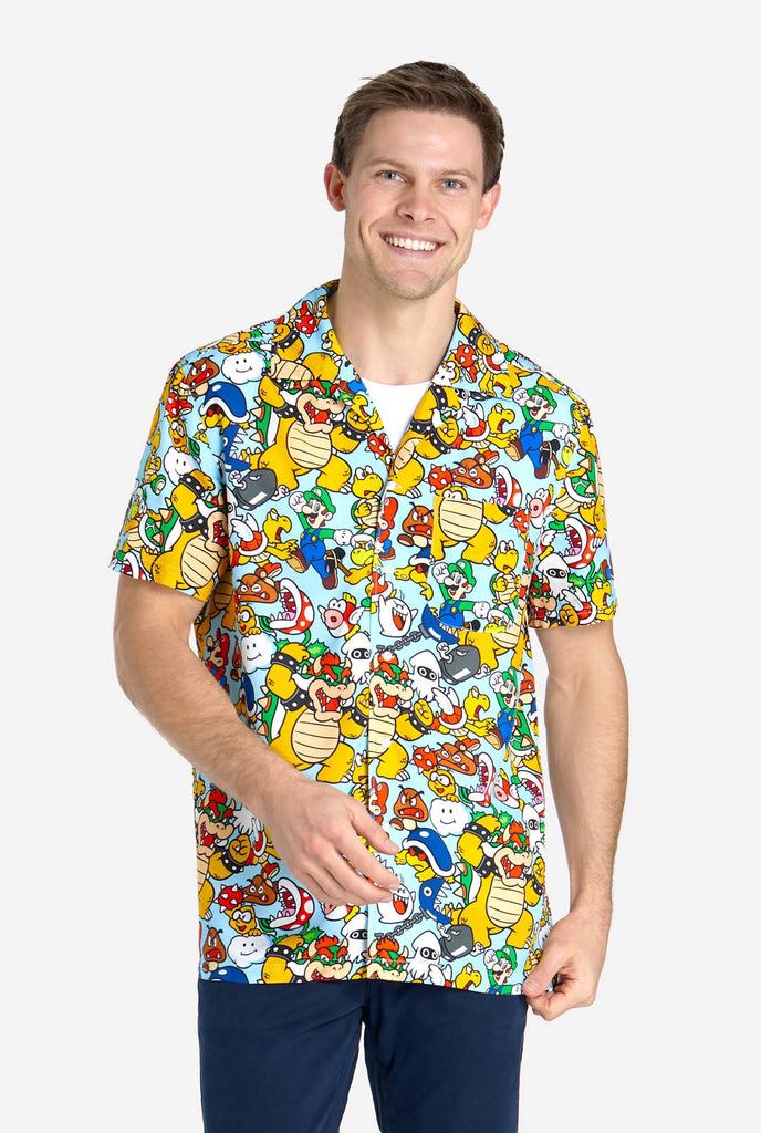 Man wearing Hawaiian shirt with Super Mario Icons