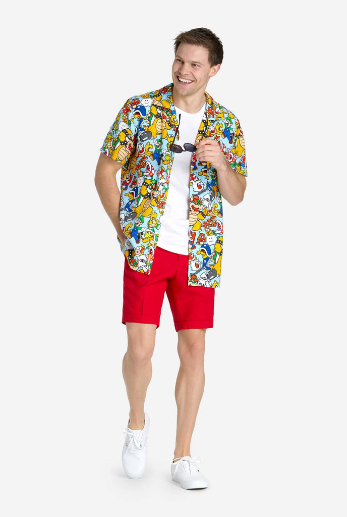 Man wearing Hawaiian shirt with Super Mario Icons