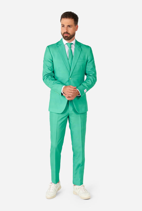 Man wearing turquoise colored suit