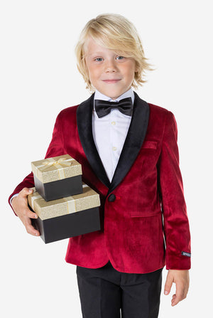 Boy wearing red velvet dinner jacket