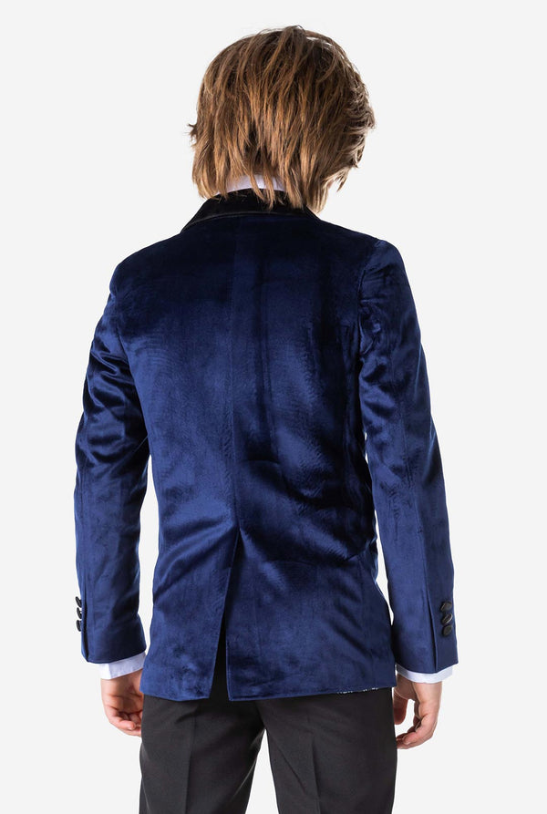 Boy wearing blue velvet Christmas dinner jacket