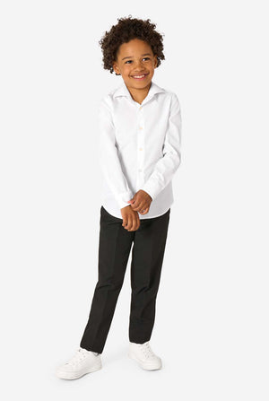 Little kid is wearing a white shirt and a black pants. Full body image