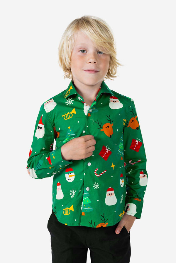 Person wearing a green Christmas-themed shirt with various festive designs on a white background