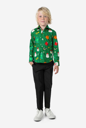 Person wearing a festive green shirt with Christmas-themed patterns on a white background. Full body image