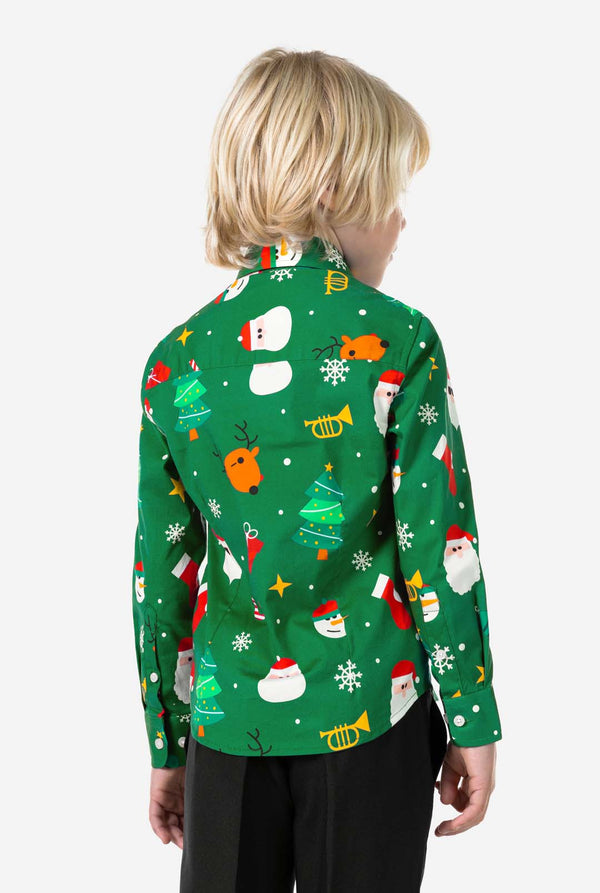 Person wearing a festive green shirt with Christmas-themed patterns on a white background. View from the back.