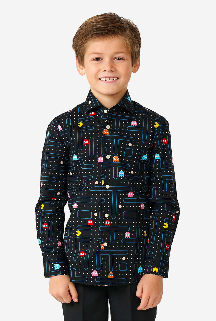 Boy wearing long sleeve boys' shirt with Pac-Man print