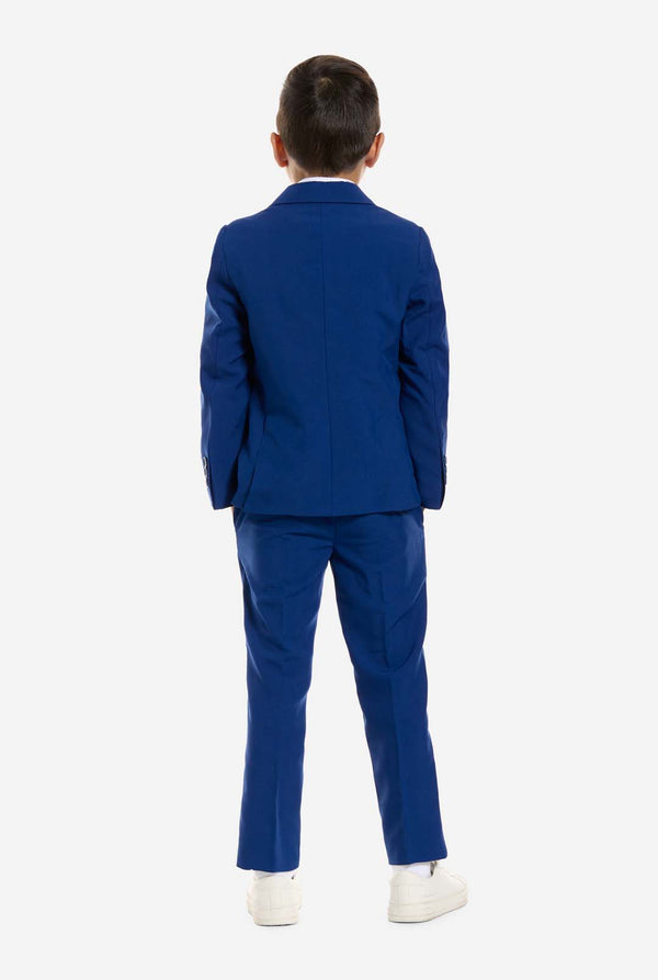 Child wearing a blue suit on a white background