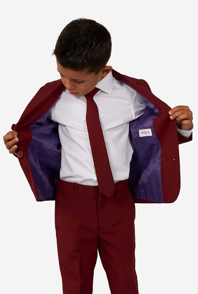 Kid wearing a burgundy red suit for boys