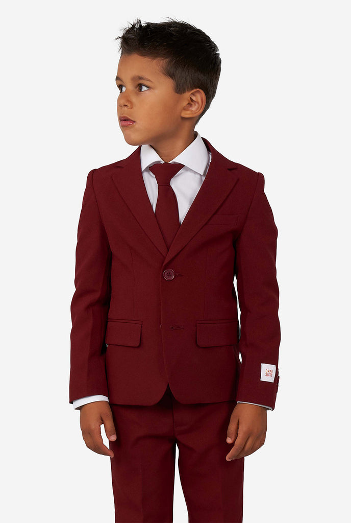 Kid wearing a burgundy red suit for boys
