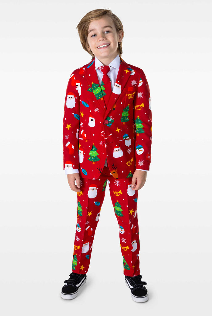 Kid wearing red Christmas suit with Christmas icons