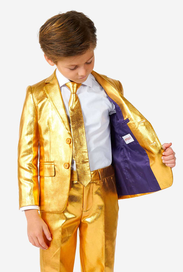 Boy wearing shining gold suit