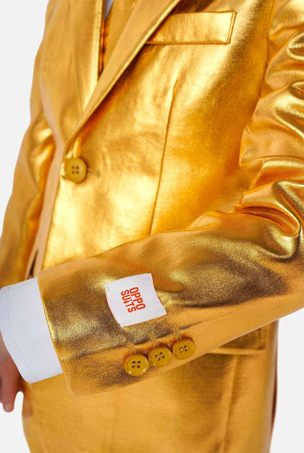 Boy wearing shining gold suit