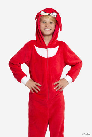 Close-up of a child wearing the Knuckles onesie with the hood on his head, showing the face of the Knuckles Onesie.