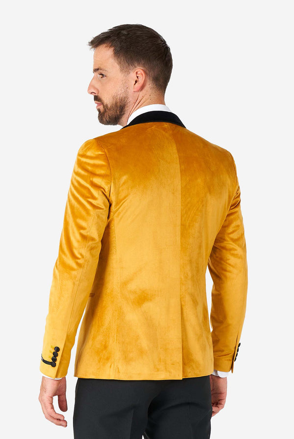 Man wearing golden velvet dinner jacket blazer