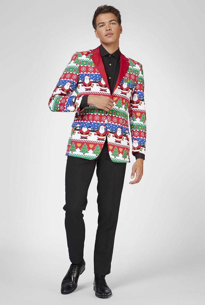 Red Ugly Christmas sweater print blazer worn by man zoomed in