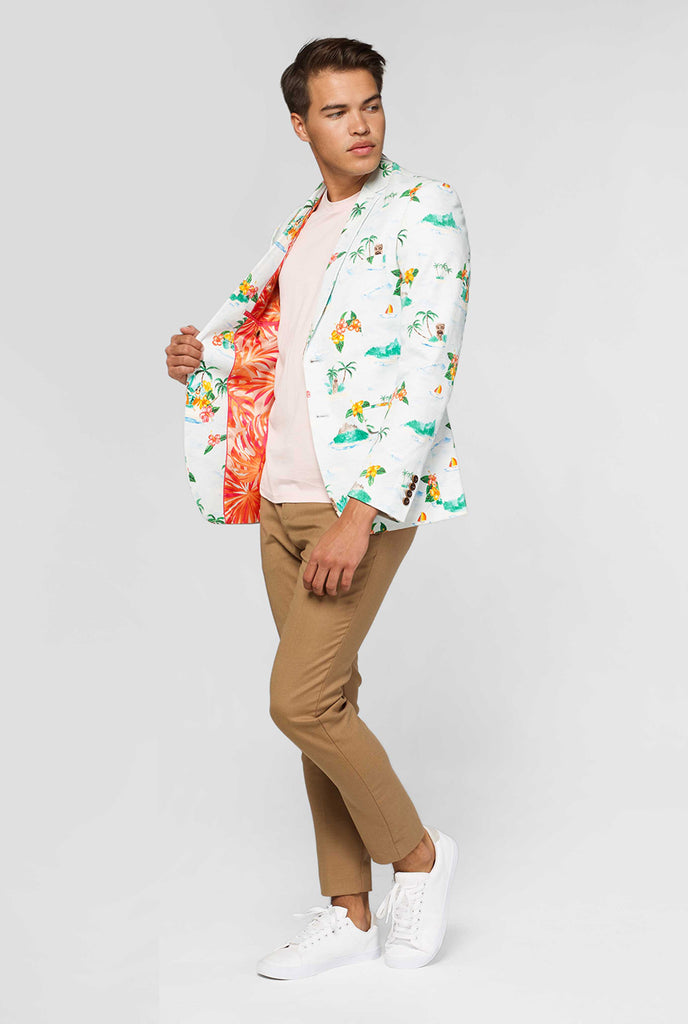 White casual blazer with Hawaiian icon print worn by man showing red palm tree inner lining