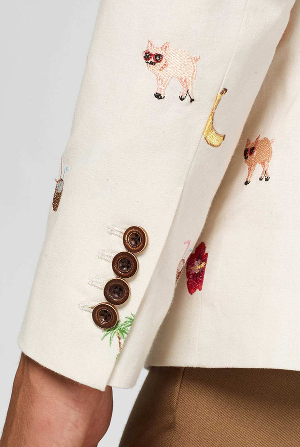 Off-white blazer with tropical embroidery worn by man