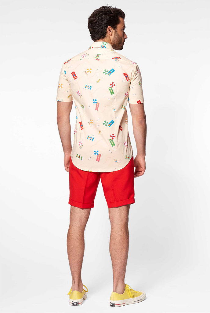 Man wearing summer shirt with beach icons