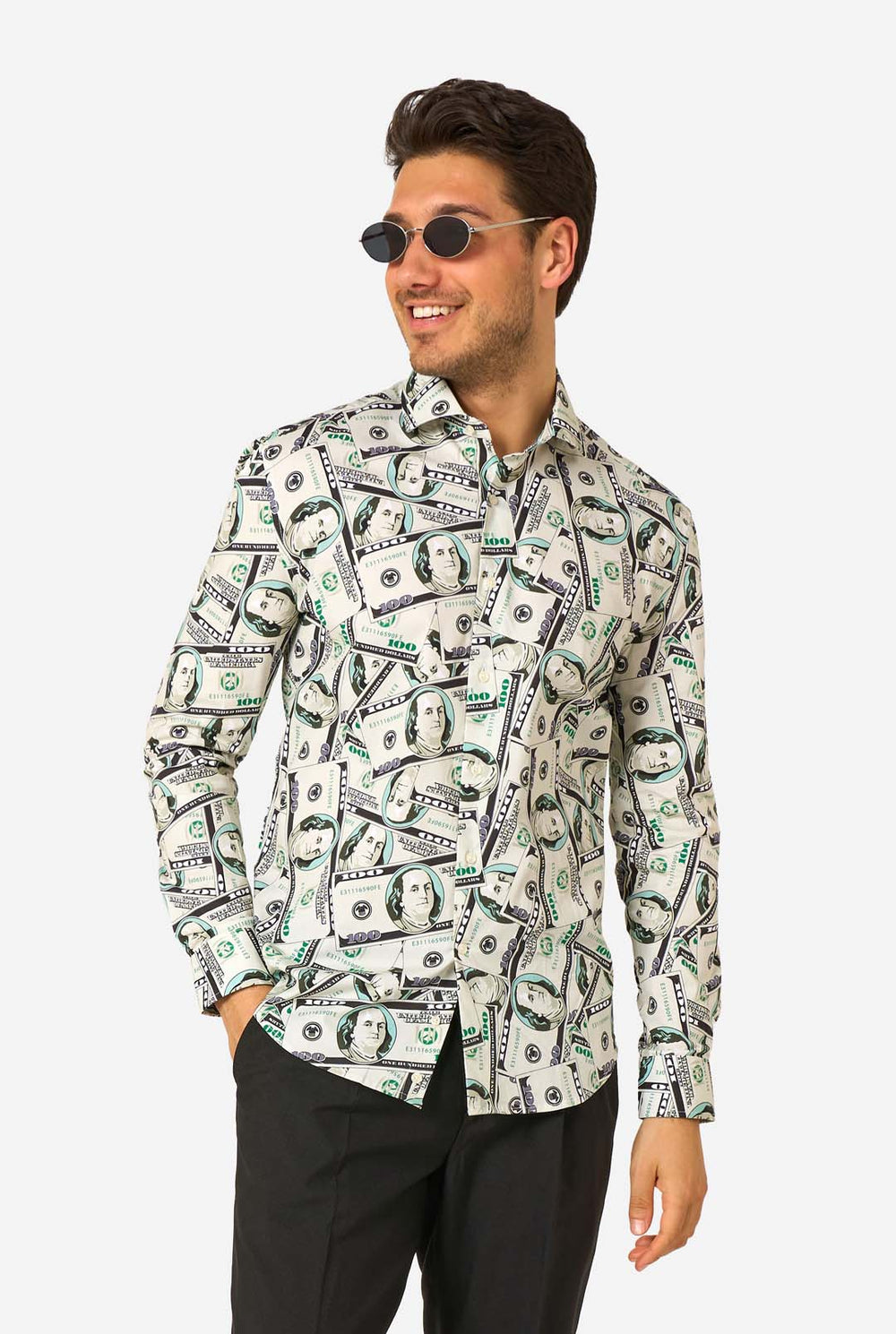 Man wearing a shirt with dollar bill print on a white background