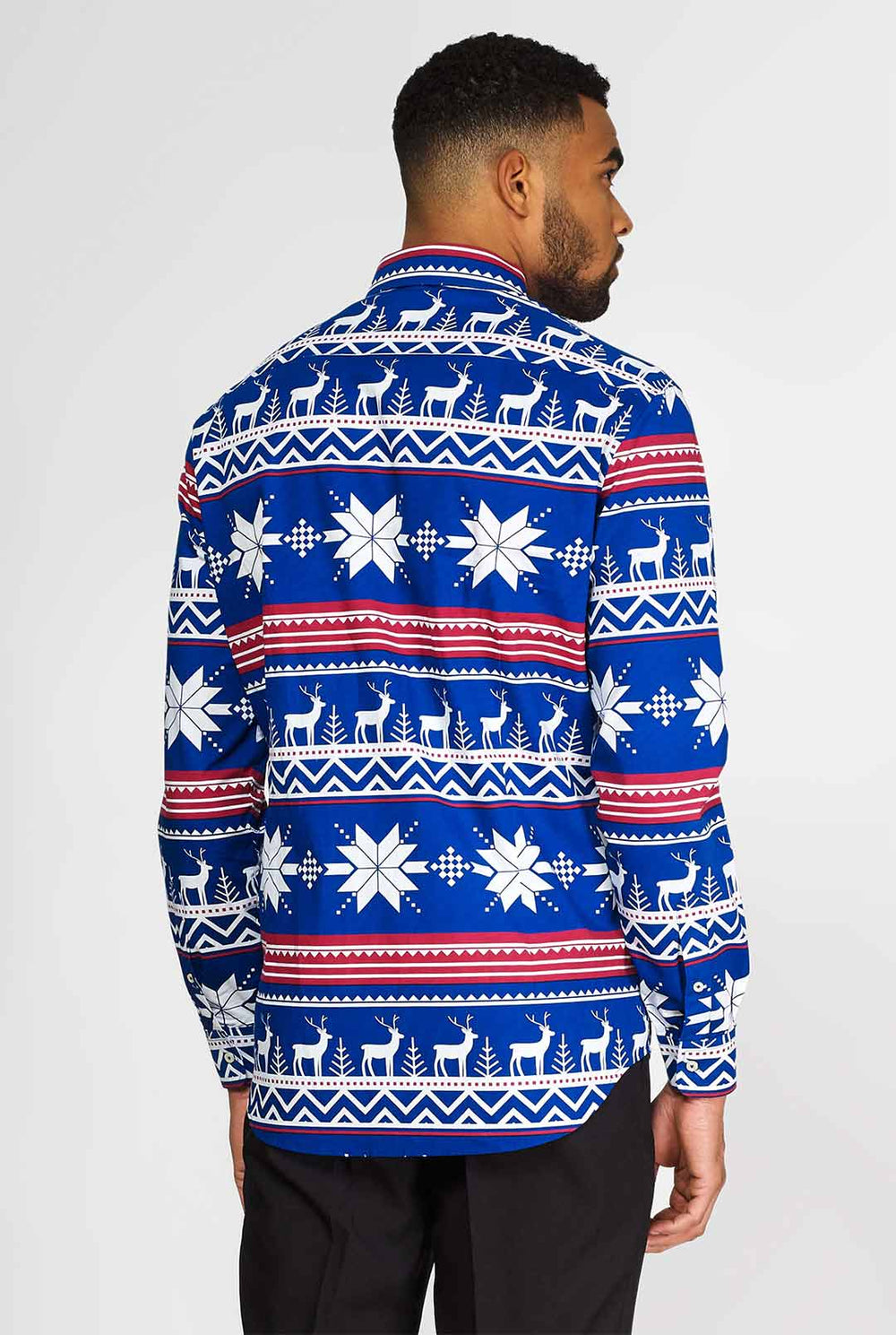 Man wearing blue dress shirt with Nordic Christmas theme