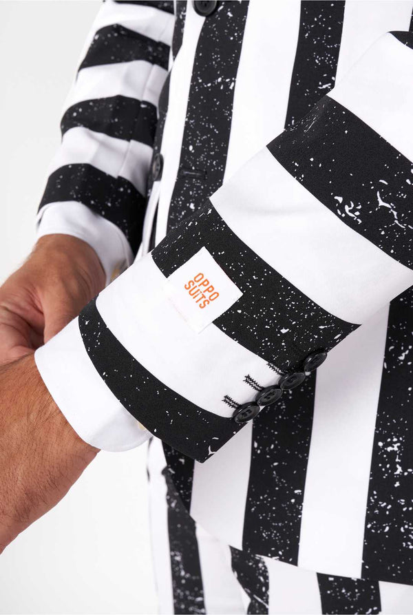 Man wearing striped black and white men's suit