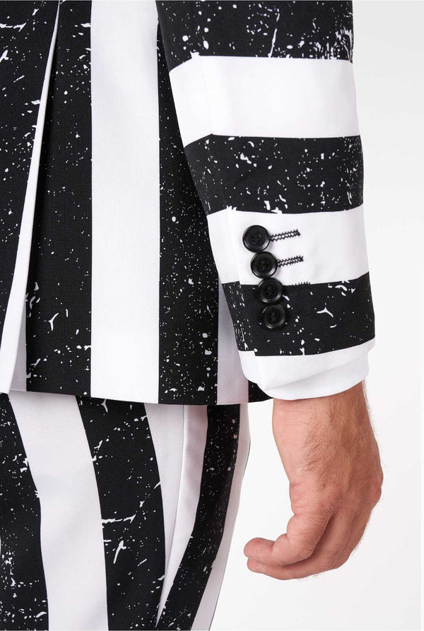 Man wearing striped black and white men's suit