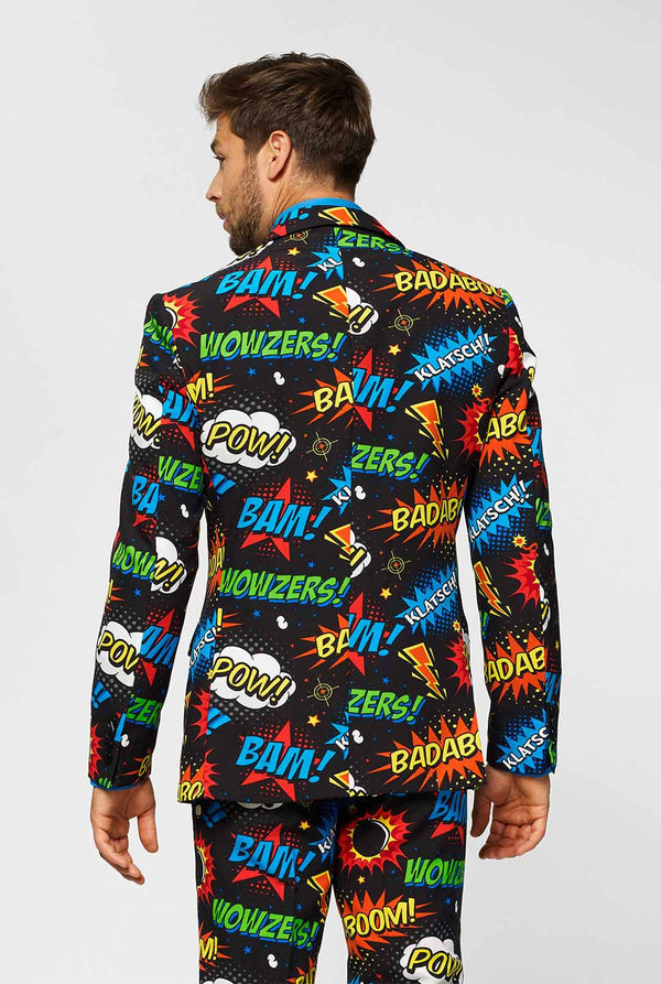 Black men's suit with comic book icons print worn by man