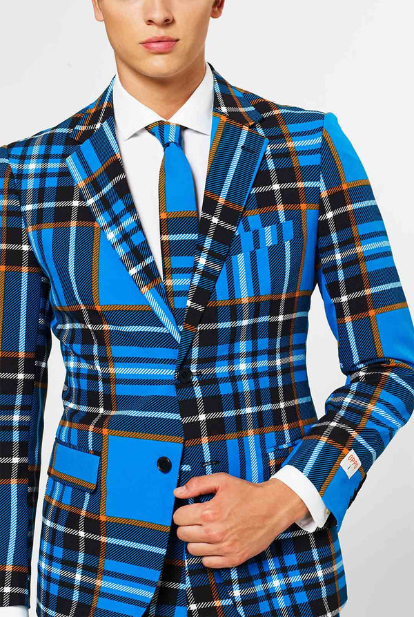 Man wearing blue tartan men's suit 