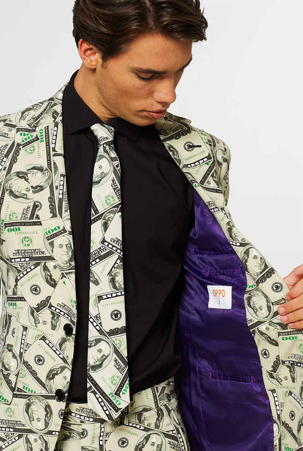 Man wearing men's suit with dollar, money print