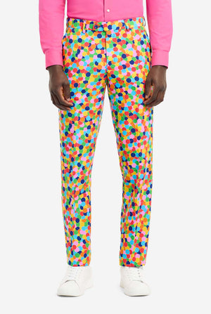 Image of a man wearing an OppoSuits Confetteroni men's suit with confetti print and pink men's shirt. Suit consist of pants, jacket and tie.