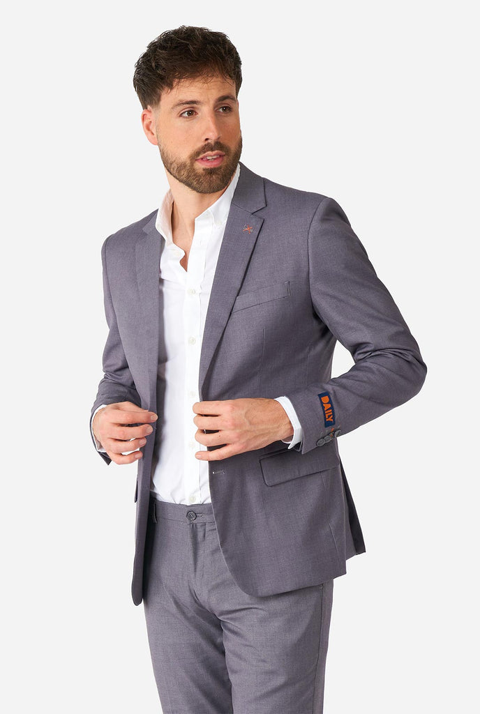 Man wearing casual grey business suit