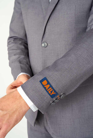 Man wearing casual grey business suit