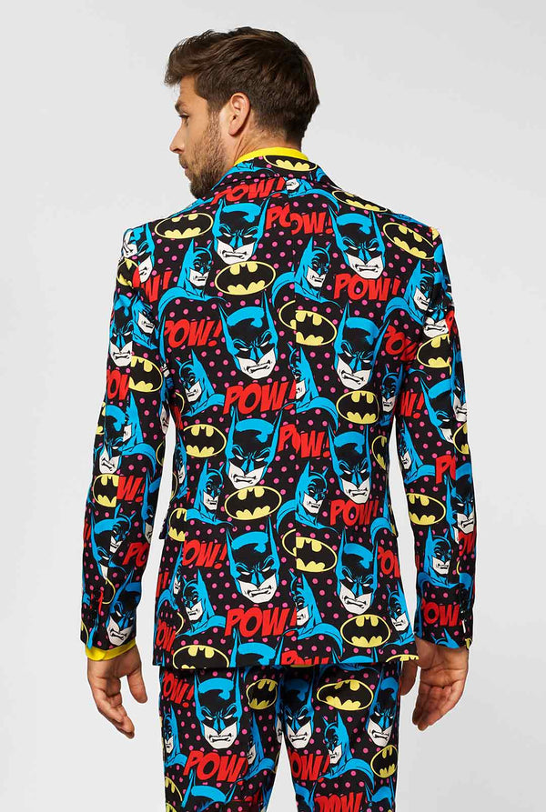 Batman themed men's suit with comic book icons worn by man