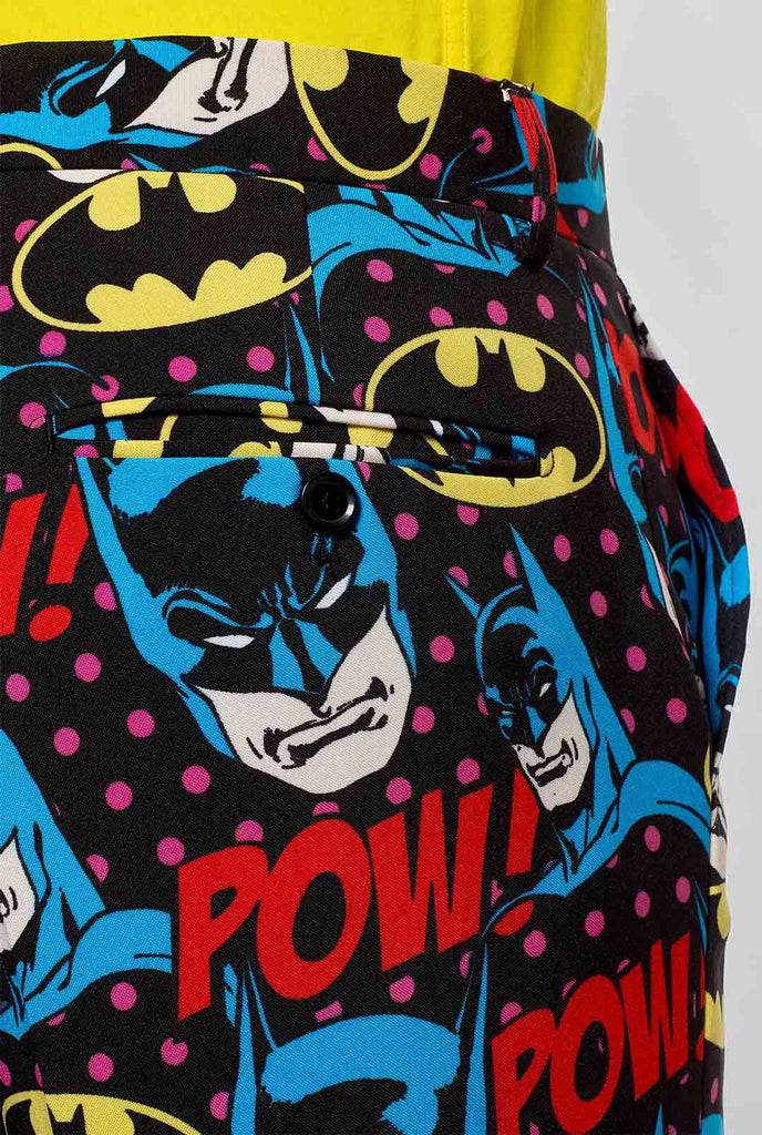 Batman themed men's suit with comic book icons worn by man