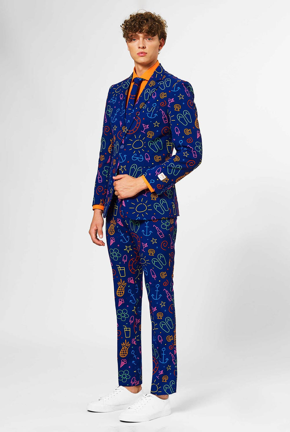 Dark blue men's  suit with bright doodle iconography worn by man