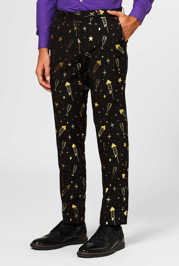 Black men's suit with golden fireworks print worn by man