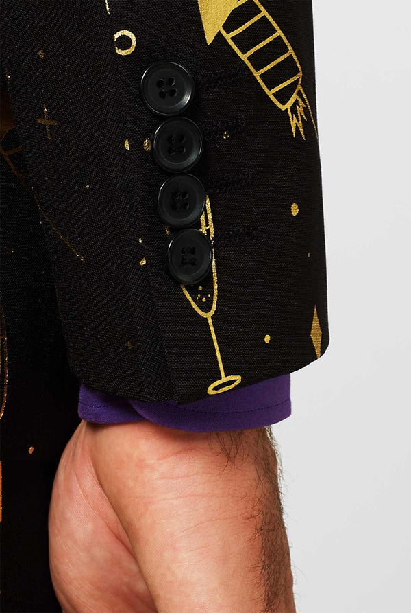 Black men's suit with golden fireworks print worn by man