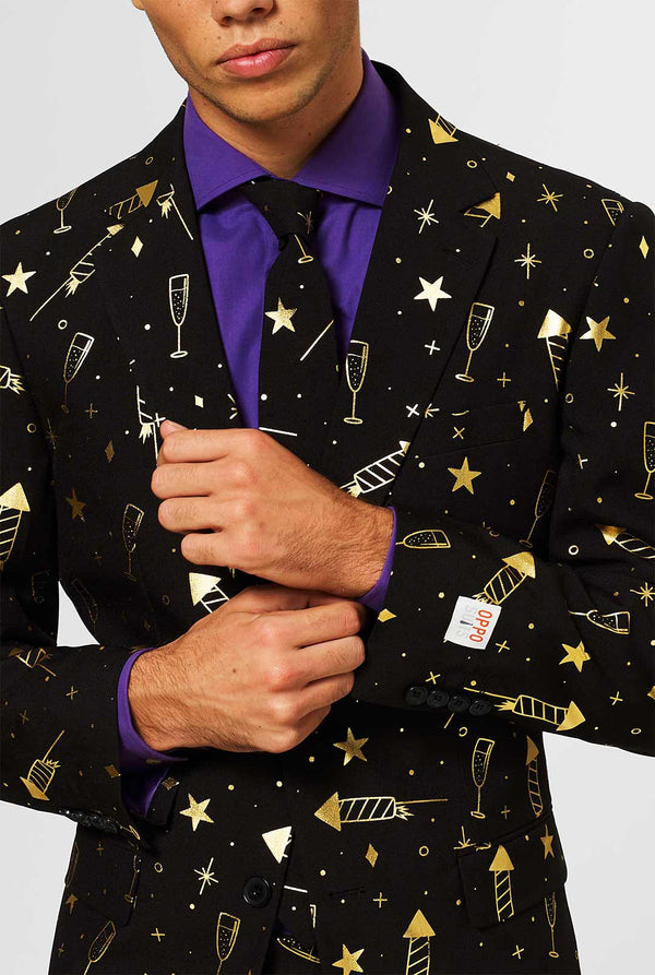 Black men's suit with golden fireworks print worn by man