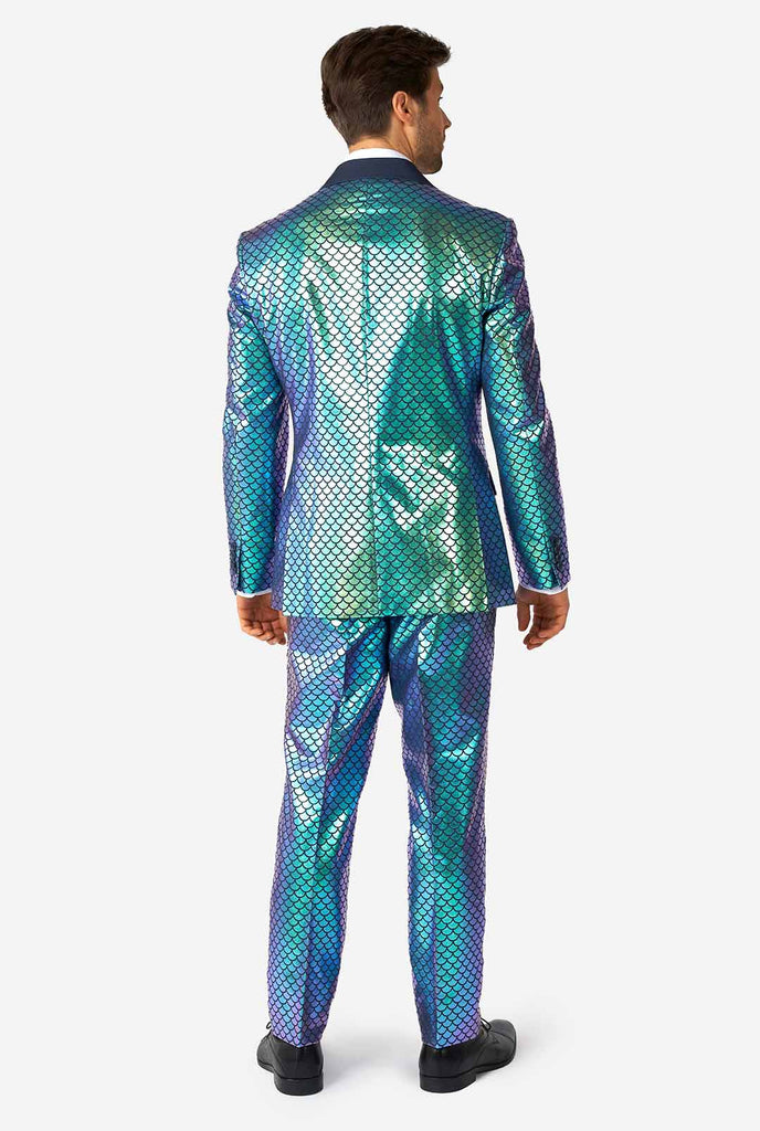 Man wearing blue fish scale motive suit