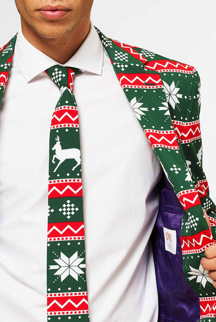 Green and red Christmas themed men's suit worn by man