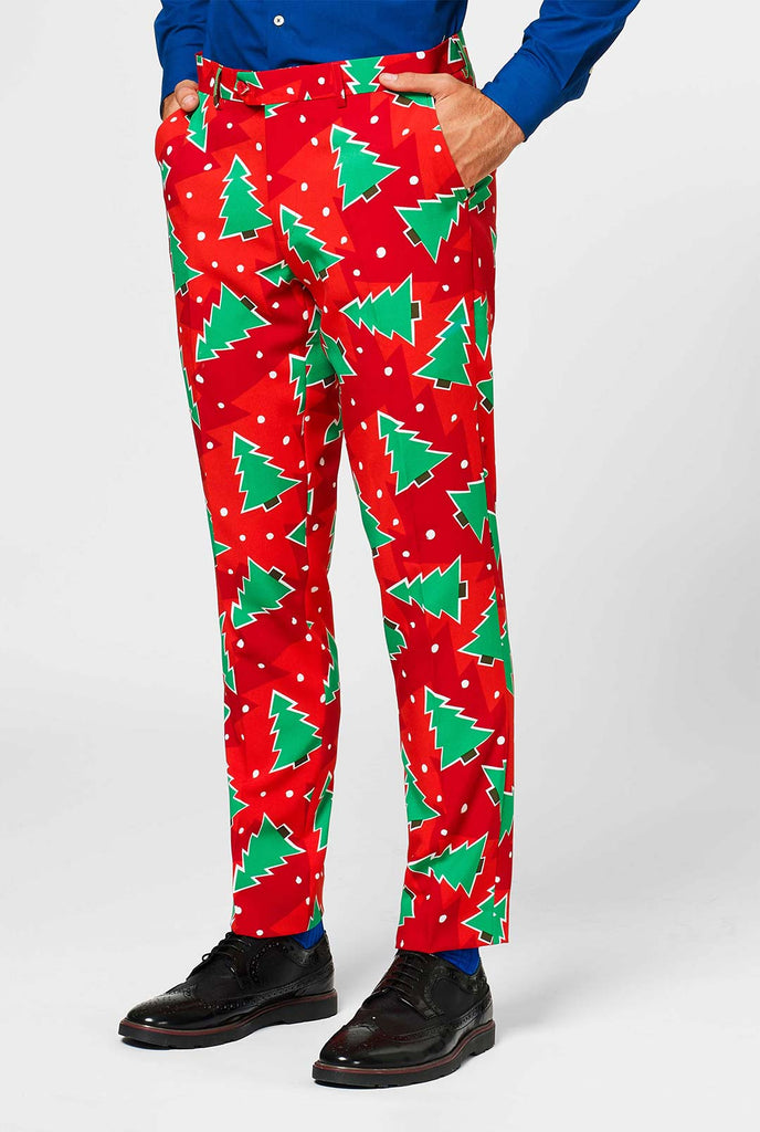 Red Christmas men's suit with pine tree print worn by man