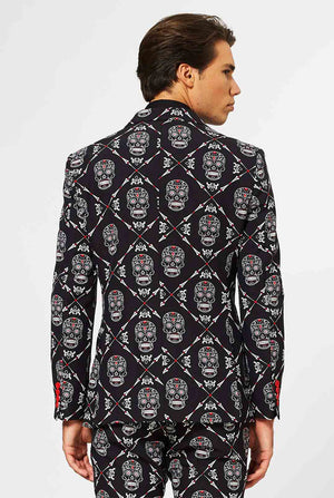 Man wearing black Halloween suit with skull print