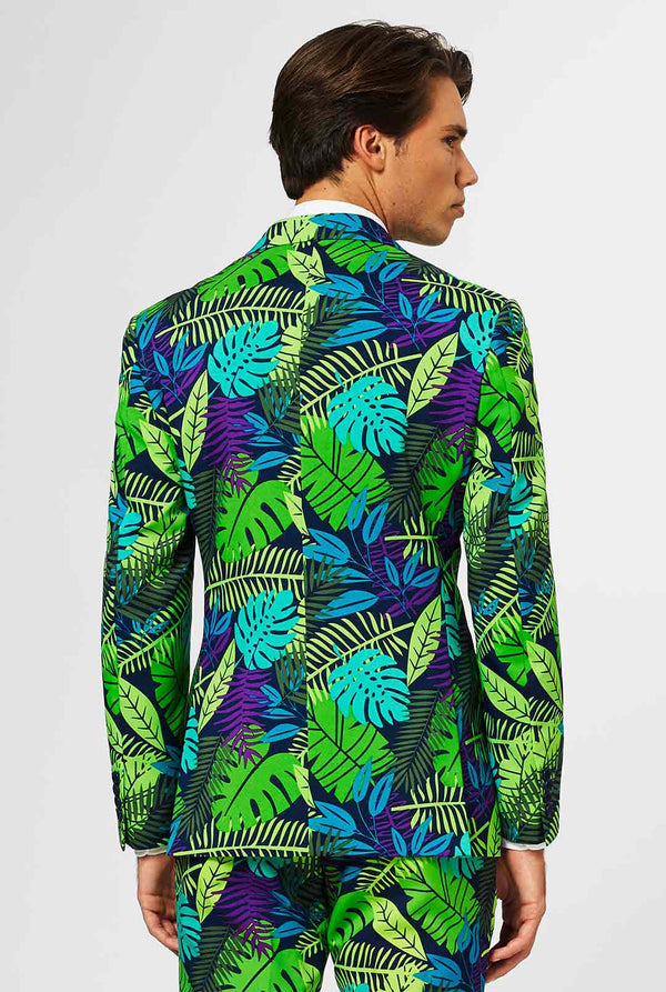 Jungle print men's suit with green and purple leaf print worn by man