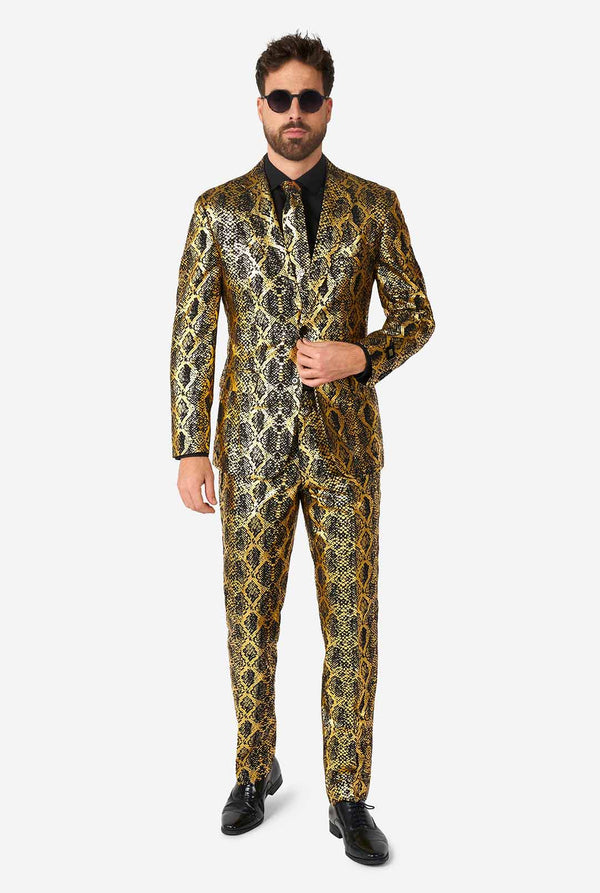 Man wearing suit with, gold and black, snakeskin print