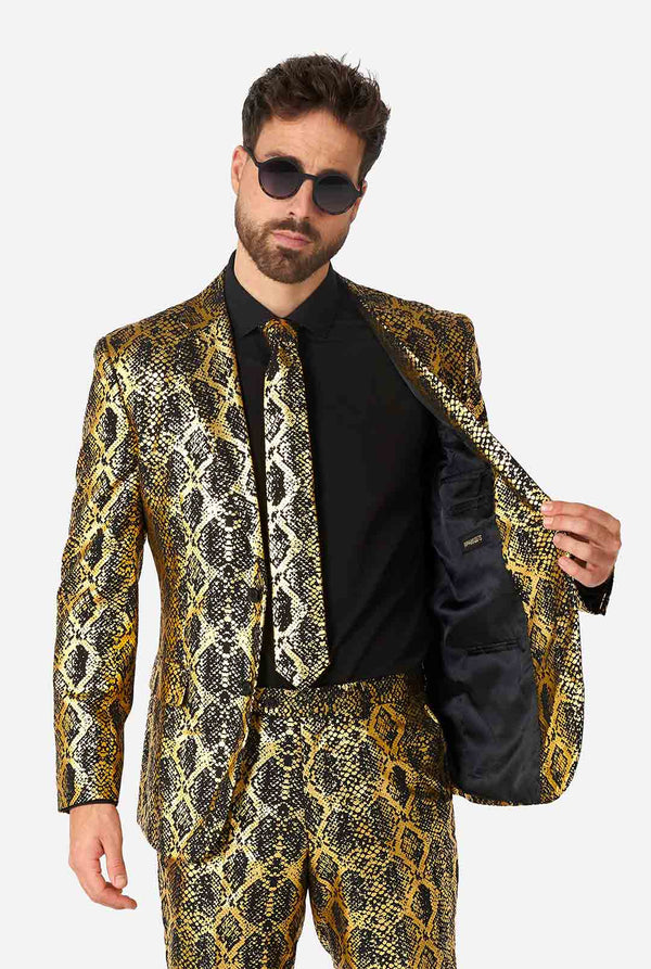 Man wearing suit with, gold and black, snakeskin print
