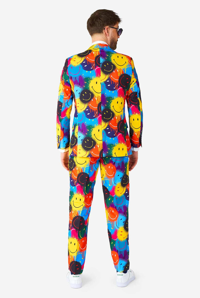 Man wearing colorful men's suit with Smiley print